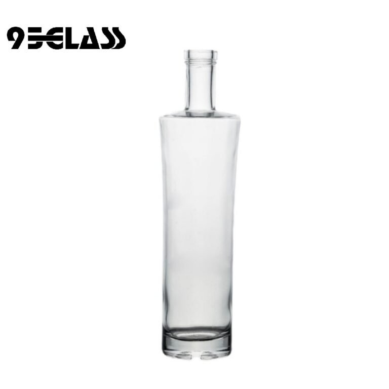 Tall crystal-clear straight glass liquor bottles for whiskey, vodka, and spirits.