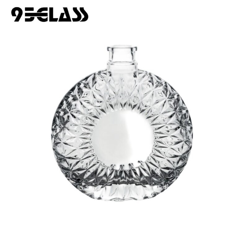 500ml clear round engraved flat mouth spirit bottle with decorative pattern for premium liquors.