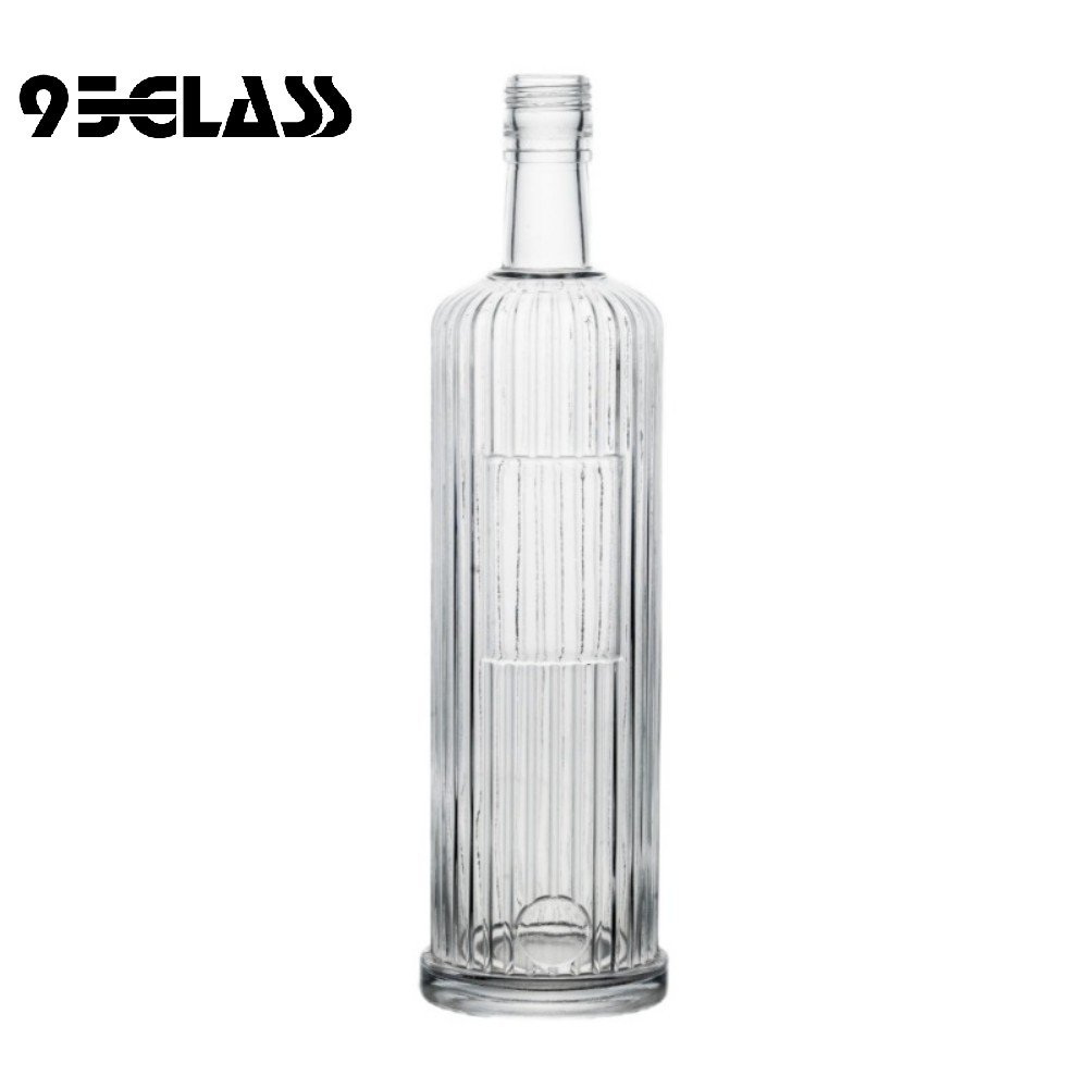 750ml clear ribbed glass spirit bottle with window, perfect for premium liquor packaging.