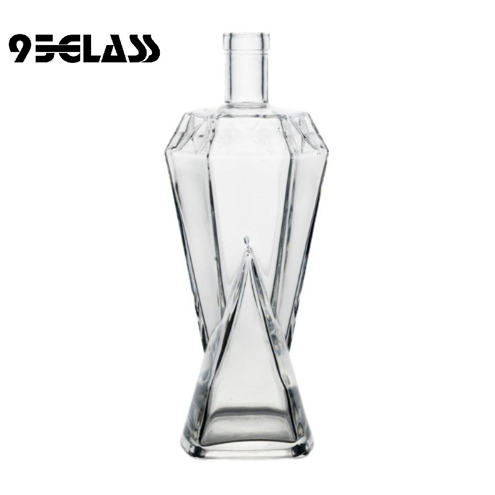 Unique geometric crystal-clear glass liquor bottle for sale, ideal for premium spirits.