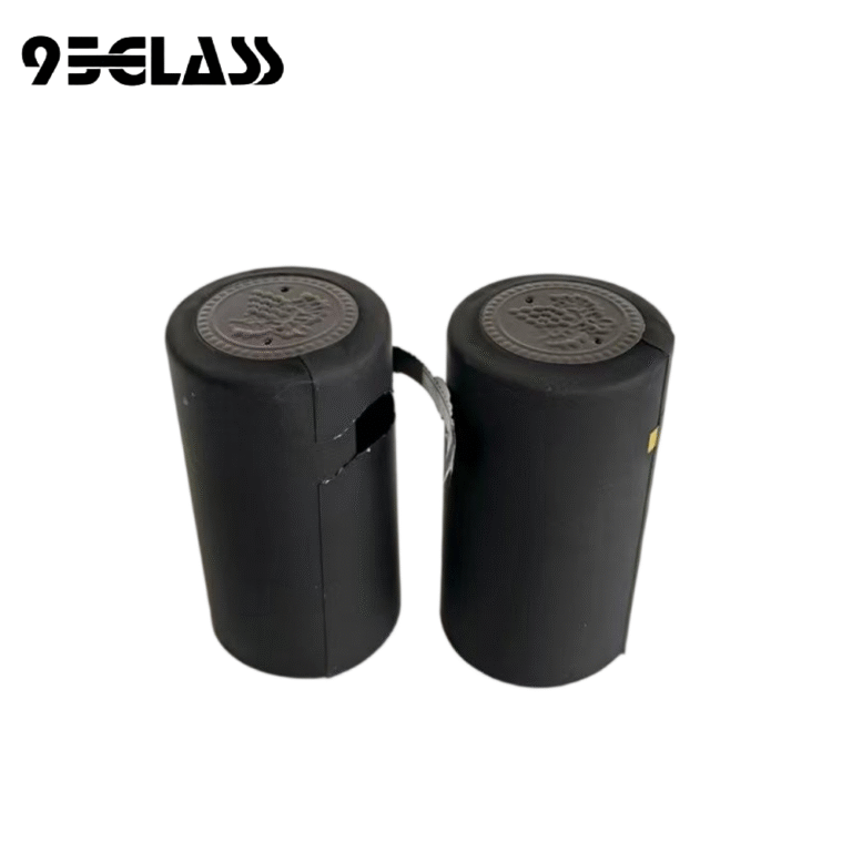 matte black tear-strip pvc capsule heat shrinker with embossed top, vent holes and silver tear strip