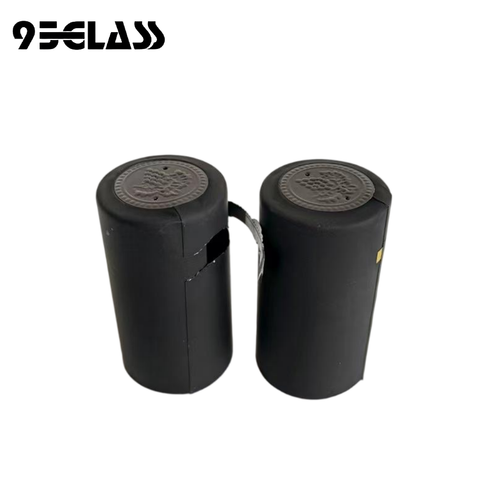 matte black tear-strip pvc capsule heat shrinker with embossed top, vent holes and silver tear strip