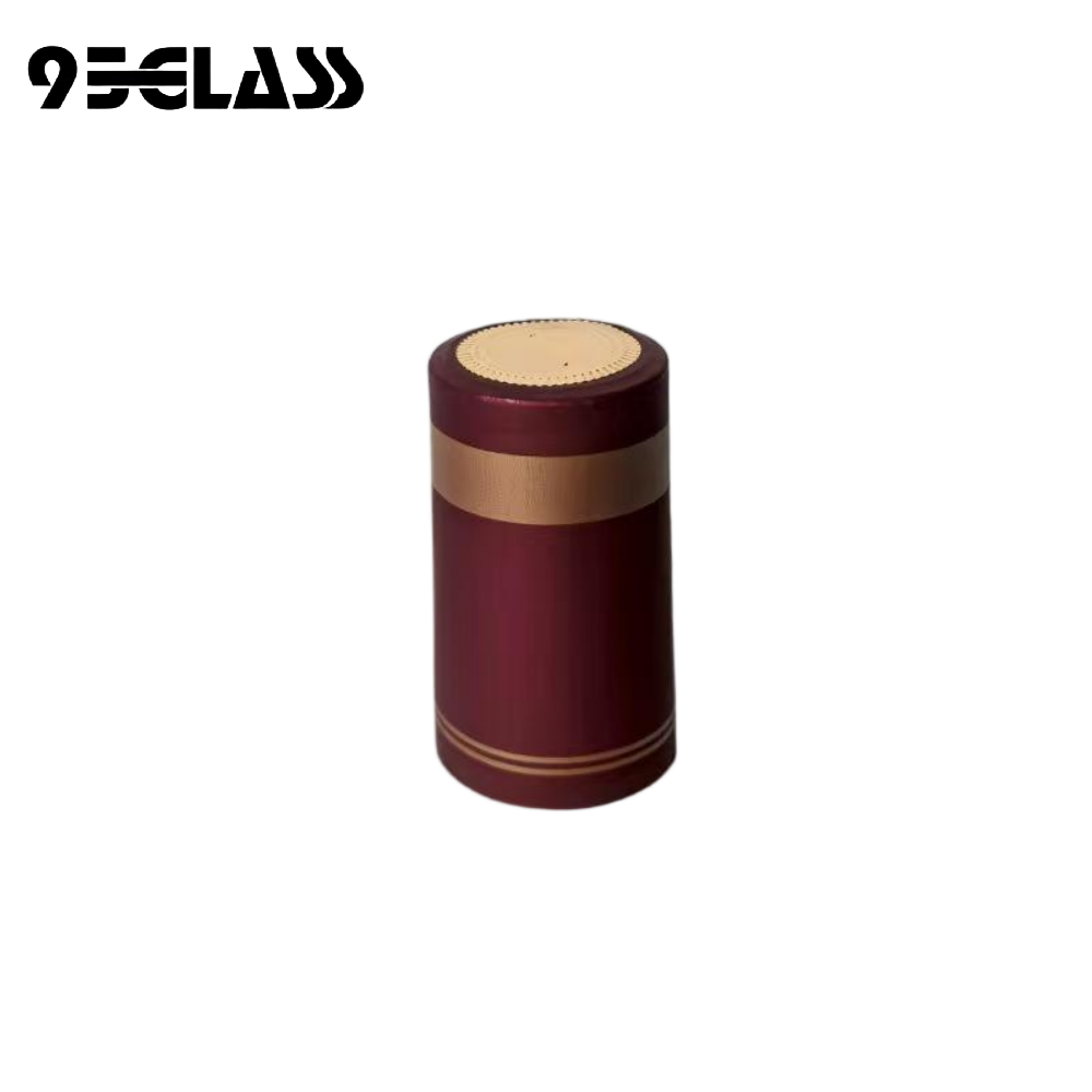 burgundy gold-banded tear-strip pvc capsule heat shrinker with coin top and vent holes