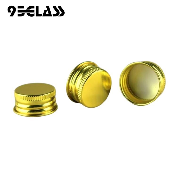 Gold aluminum screw cap with knurled side for liquor bottle, featuring metallic shine and secure grip.