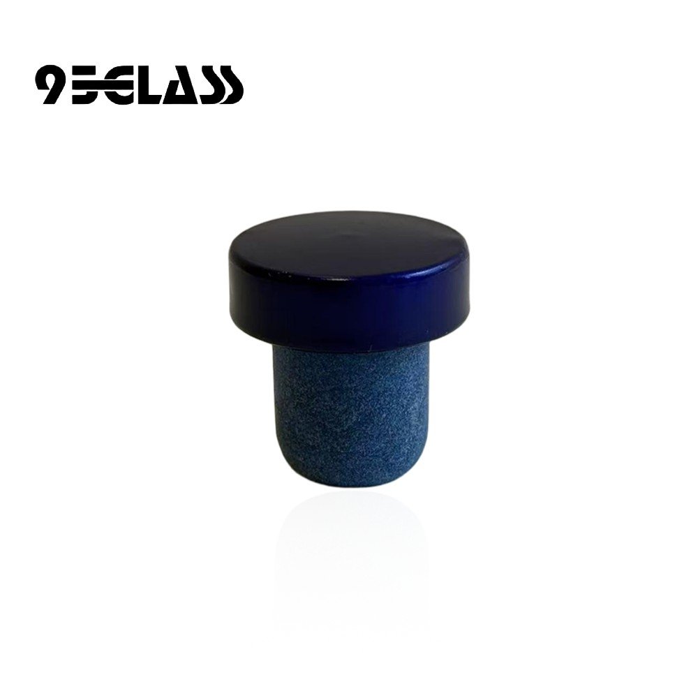 Navy blue aluminum T-top bottle cork with blue synthetic shank, flat-finish compatible.