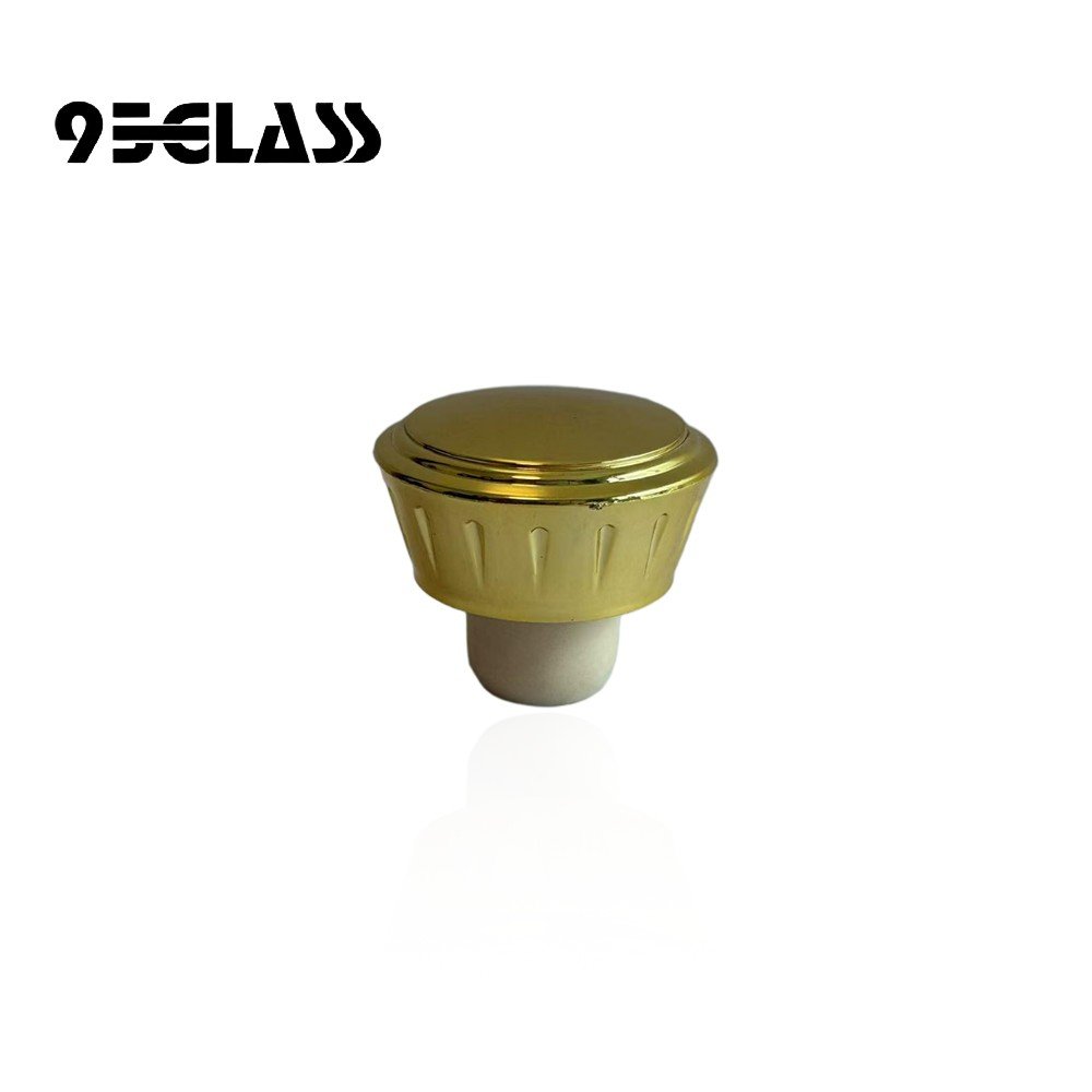 Gold plastic fluted T-top bottle cork with white synthetic shank, flat-finish compatible.